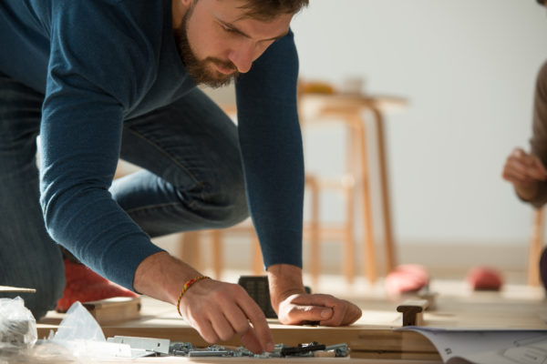 Man Building Sliding Wardrobe